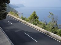 Coastal Road in Spain: Blue Ocean and Bridge