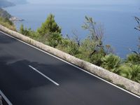 Coastal Road in Spain: Blue Ocean and Bridge