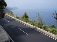 Coastal Road in Spain: Blue Ocean and Bridge