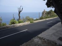 Coastal Road in Spain: Blue Ocean and Bridge