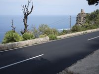 Coastal Road in Spain: Blue Ocean and Bridge