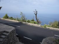 Coastal Road in Spain: Blue Ocean and Bridge