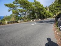 Spain Coastal Road with Mountains and Clear Sky