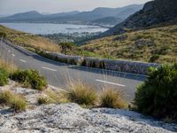 Coastal Road in Spain: Mountains and Water Views