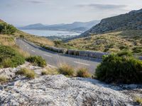 Coastal Road in Spain: Mountains and Water Views