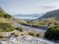 Coastal Road in Spain: Mountains and Water Views