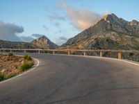 Spain: Curved Road at Dawn with Armco Barriers