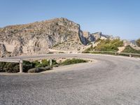 Spain's Mountain Road: Clear Sky and Ocean Views