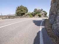 Spain Road: An Asphalt Lane Under a Clear Sky