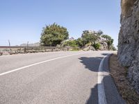 Spain Road: An Asphalt Lane Under a Clear Sky