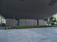 an empty street is shown as an open area with benches in the center of it