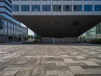 a picture of a very big building with a large triangle shape in the middle of the image