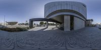 this is an image of a building in perspective with a circular lens to the front and rear