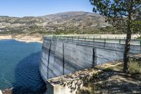 the fence is made to provide easy access to the lake from the dam or dam