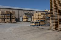 stacks of wooden pallets are parked at the warehouse near other pallets in pallets