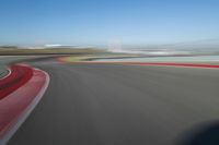 Straight Down the Road: Race Track in a Clear Sky