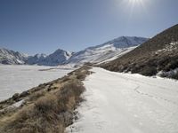 Straight Down the Road in Snowy Alps