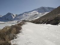 Straight Down the Road in Snowy Alps