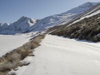 Straight Down the Road in Snowy Alps