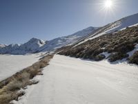 Straight Down the Road in Snowy Alps