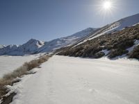 Straight Down the Road in Snowy Alps