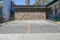 Straight Down the Road with Stone Wall in Suburban Toronto