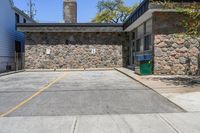 Straight Down the Road with Stone Wall in Suburban Toronto