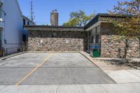 Straight Down the Road with Stone Wall in Suburban Toronto