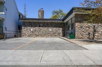 Straight Down the Road with Stone Wall in Suburban Toronto