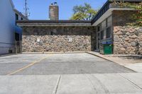 Straight Down the Road with Stone Wall in Suburban Toronto