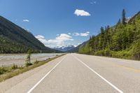 Straight Down the Road in Canada: A Landscape with Water