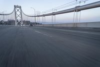 Straight Down the Road at Dawn: Asphalt and Clear Sky