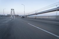 Straight Down the Road at Dawn: Asphalt and Clear Sky