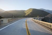 Straight Down the Road: POV of a Bridge