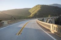 Straight Down the Road: POV of a Bridge