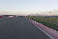 Straight Down the Road: POV of a Field Surrounded by Lines