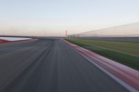 Straight Down the Road: POV of a Field Surrounded by Lines