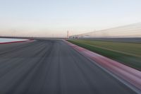 Straight Down the Road: POV of a Field Surrounded by Lines