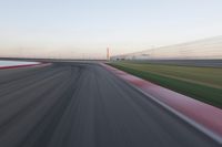 Straight Down the Road: POV of a Field Surrounded by Lines