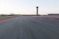 A POV Shot: Straight Down the Road Towards the Racing Stadium