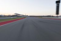 A POV Shot: Straight Down the Road Towards the Racing Stadium