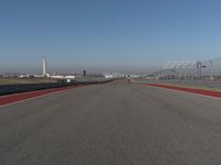 Straight Down the Road: POV View of a Clear Sky