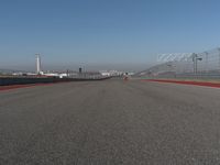 Straight Down the Road: POV View of a Clear Sky