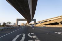 Straight Down the Road: Urban Underpass in Daylight