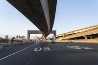 Straight Down the Road: Urban Underpass in Daylight