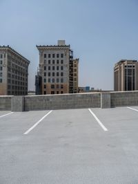 a parking lot and wall are pictured in a photo from the perspective point of view