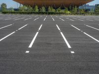 Straight Road in the City: Asphalt and Clear Sky