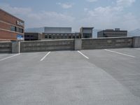 a parking lot and wall are pictured in a photo from the perspective point of view