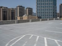 a parking lot and wall are pictured in a photo from the perspective point of view