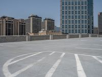 a parking lot and wall are pictured in a photo from the perspective point of view